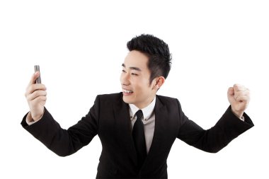 Cep telefonu saati olan bir iş adamı.