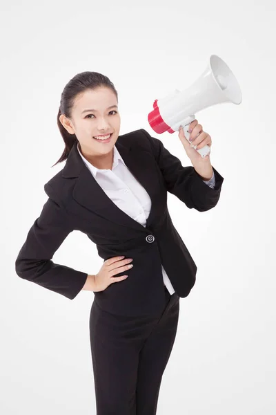 Oriental business woman using a microphone — Stock Photo, Image