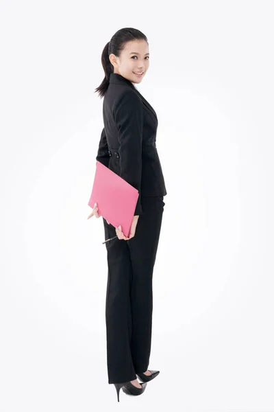 Módní obchodní žena držící složku — Stock fotografie