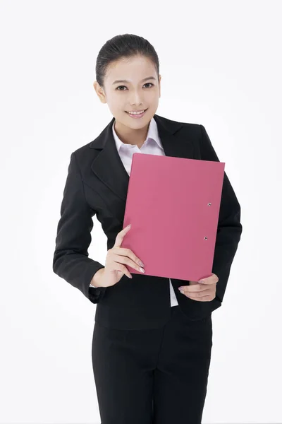 Fashion business woman holding a folder — Stock Photo, Image