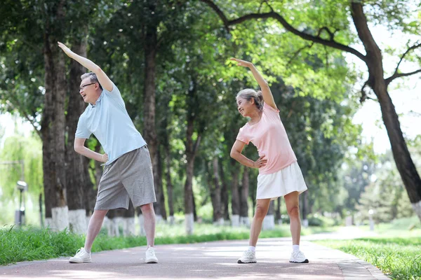 Happy Old couple sports in the park