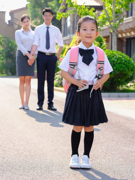 Young parents send their children to school