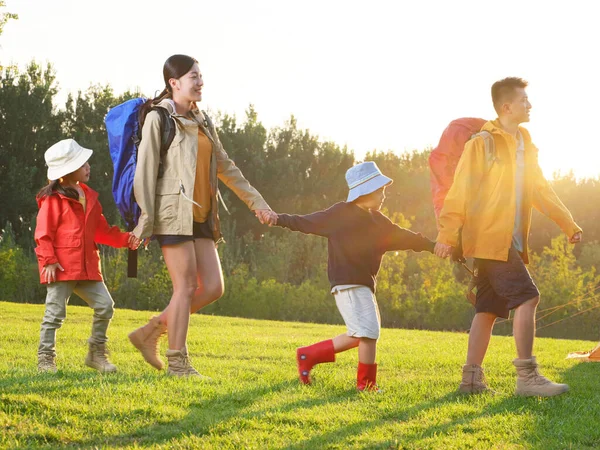 A Happy family of four outdoor hiking — Stock Photo, Image