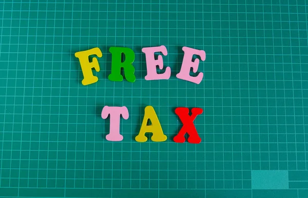 Multicolor Text Free Tax Auf Grüne Schnittmatte — Stockfoto