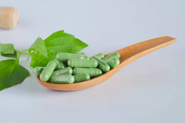Herbal Capsules Wooden Spoon Herb Leaf White — Stockfoto