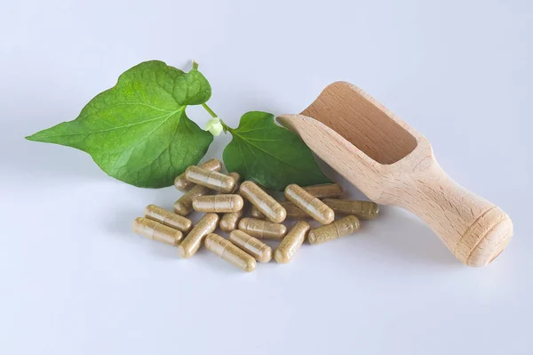 Herbal Capsules Wooden Spoon Herb Leaf White — Zdjęcie stockowe