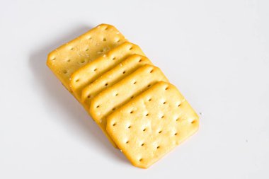 Kuru kraker ya da arka planda bisküvi, yiyecek kavramı.