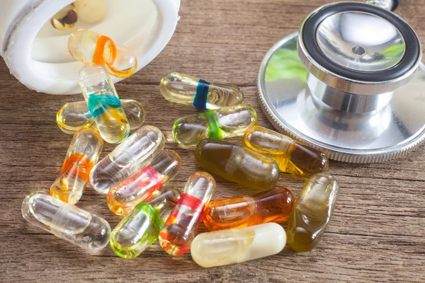 Stethoscope and Capsule pills — Stock Photo, Image