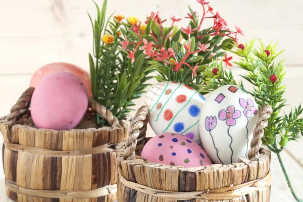 Easter eggs lying on wood — Stock Photo, Image