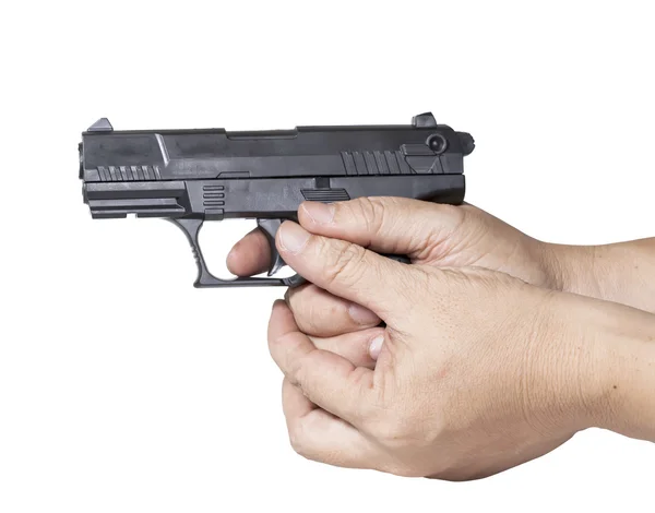 Mão segura arma isolada no fundo branco . — Fotografia de Stock