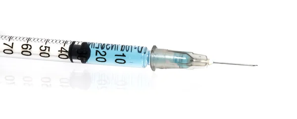 Syringe isolated over white Royalty Free Stock Photos