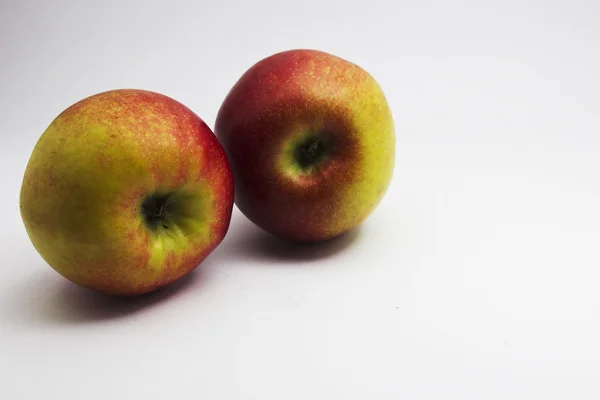 Two apples isolated on white background. Red and yellow. — Stock Photo, Image