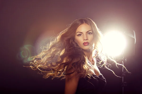 Close up fashion model girl portrait with long blowing hair. — Stock Photo, Image