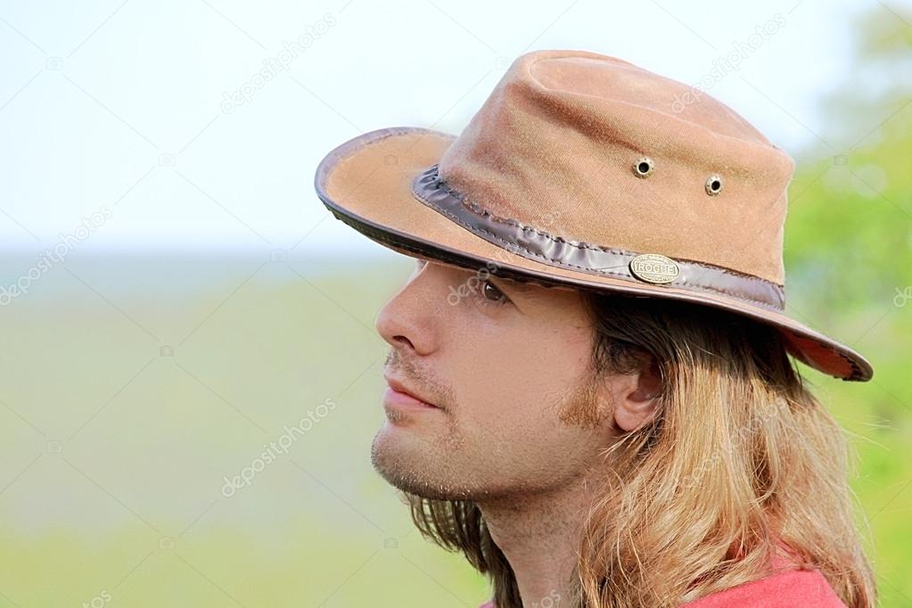 Cowboy with long blonde hair - wide 8