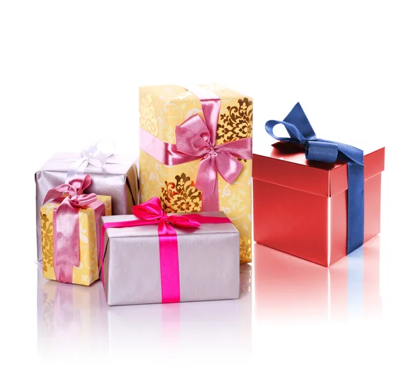 Pile of christmas gifts isolated on white — Stock Photo, Image