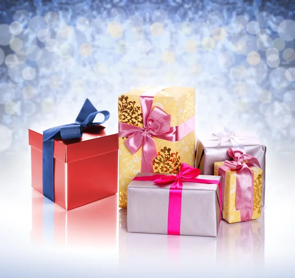 Pile of christmas gifts isolated on white — Stock Photo, Image