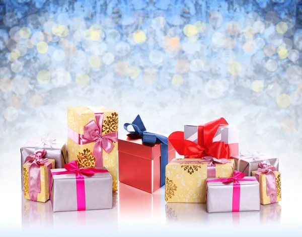 Pile of christmas gifts isolated on white — Stock Photo, Image