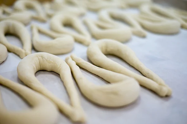 Fresh Pretzel or Brezel Dough on Wax Tray — 图库照片
