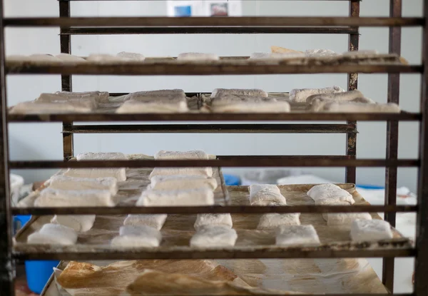 Tray Rack of Raw Ciabatta Bread Rolls