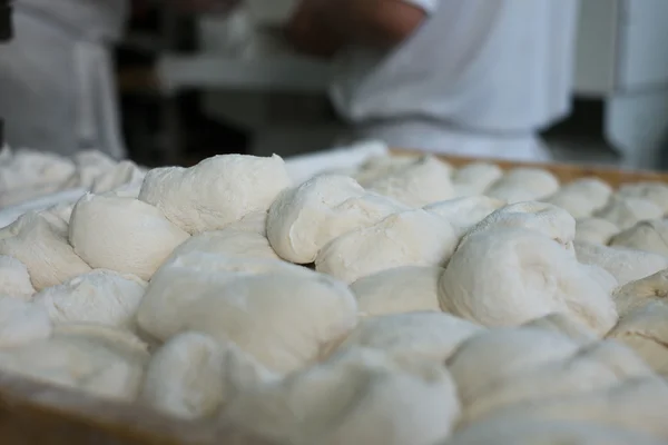 Raw Bread Dough in Front of Bakers — Zdjęcie stockowe