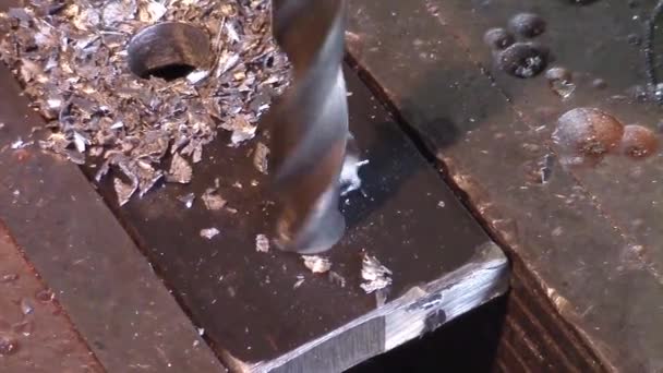 Steel drill perforating metal — Stock Video
