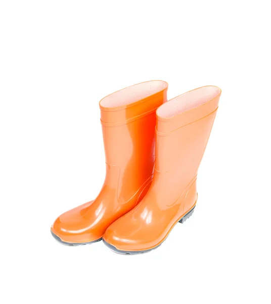 Botas de borracha laranja isoladas em branco — Fotografia de Stock