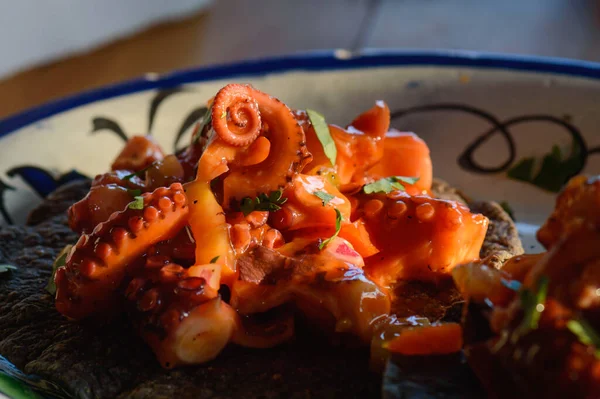 Octopus Ceviche on Blue Corn Tostadas, Mexican Seafood Dish Ліцензійні Стокові Фото