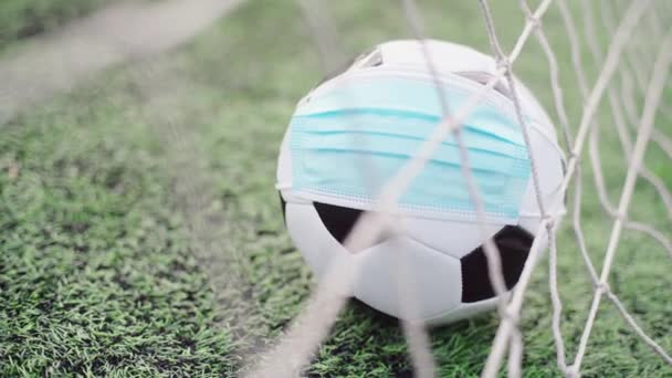 Soccer Ball Medical Mask Stadium Green Grass Ball Goal Net — Stock Video