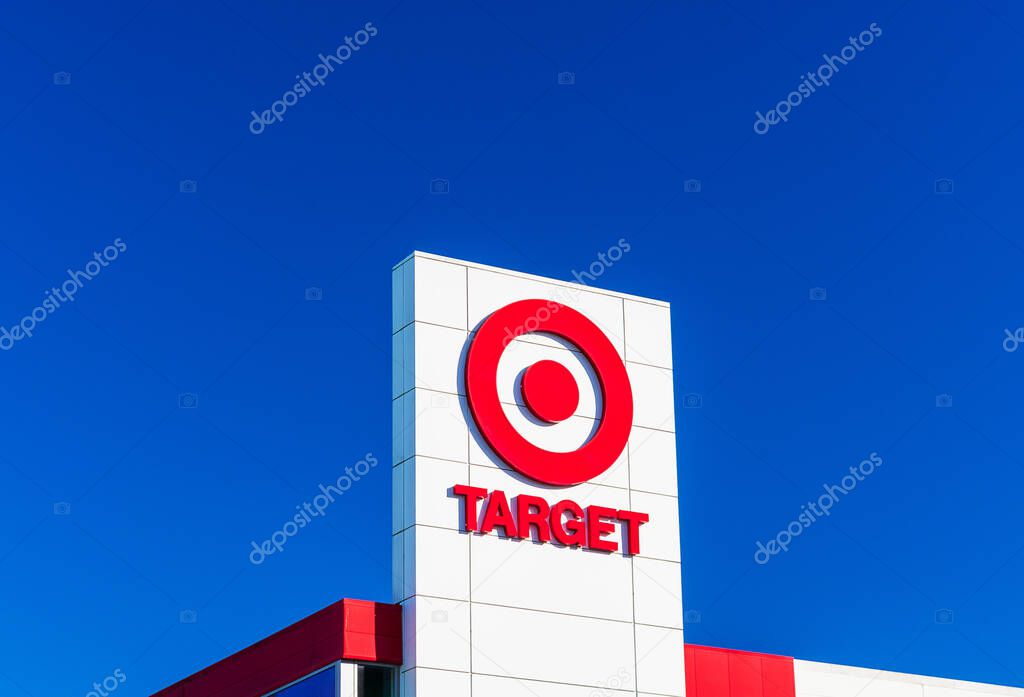Target bullseye logo on the store facade with beautiful blue sky - Sunnyvale, California, USA - 2020