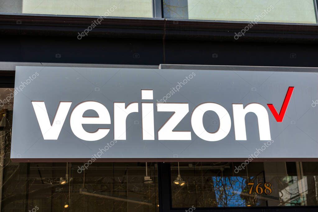 Verizon sign at the entrance to wireless mobile cell phone retail store - San Francisco, California, USA - 2020