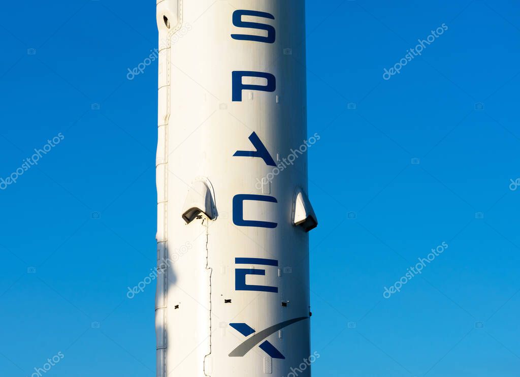 SpaceX sign logo on Falcon 9 rocket booster displayed at SpaceX headquarters. SpaceX is a private American aerospace manufacturer - Hawthorne, California, USA - 2020