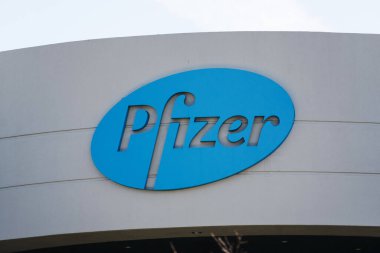 Pfizer logo on pharmaceutical corporation campus. Pfizer Inc. is a multinational pharmaceutical corporation headquartered in New York City - South San Francisco, CA, USA - 2020 clipart
