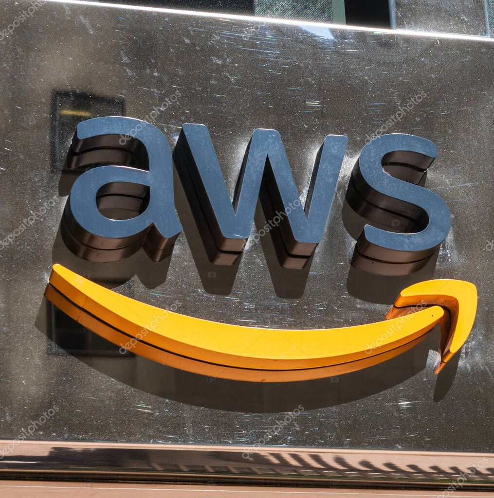 AWS sign on the facade of Amazon office for AWS customers, startups and developers interested in learning more about AWS service - San Francisco, California, USA - Circa, 2019