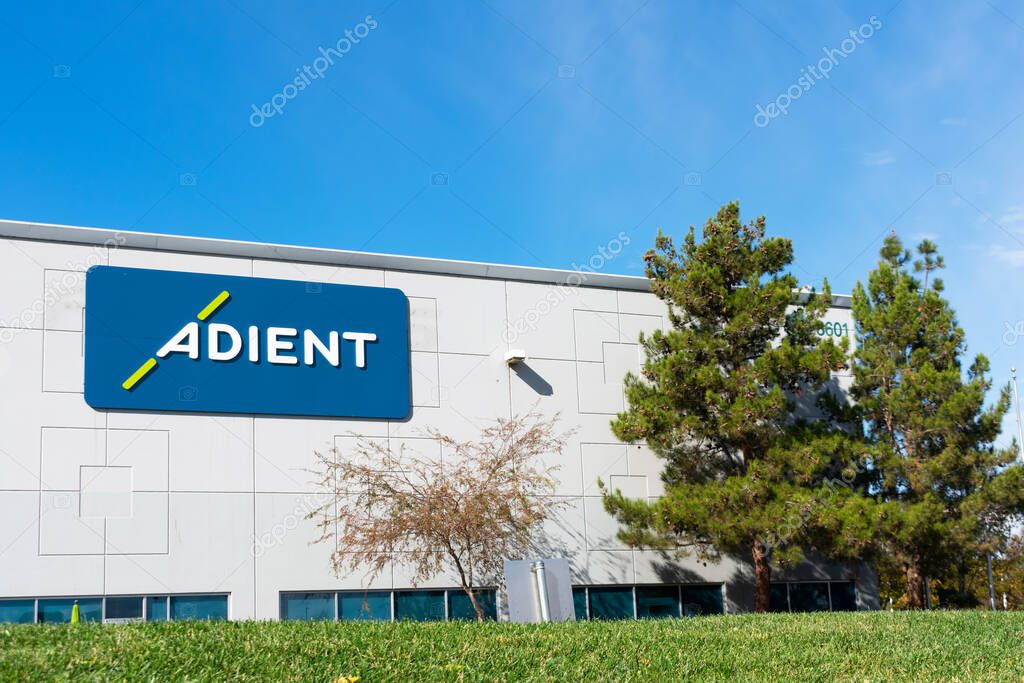Adient logo sign on headquarters of American Irish company that manufactures automotive seating company - Newark, California, USA - 2020