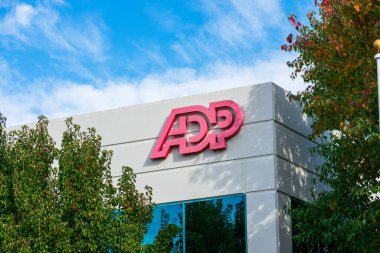 ADP logo, sign on headquarters. Automatic Data Processing Inc.is an American provider of human resources management software and services - Pleasanton, California, USA - 2020 clipart