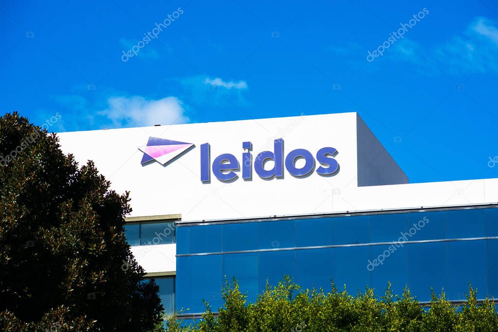Leidos sign logo on office facade. Leidos is an American defense, aviation, information technology, and biomedical research company - San Diego, California, USA - 2020