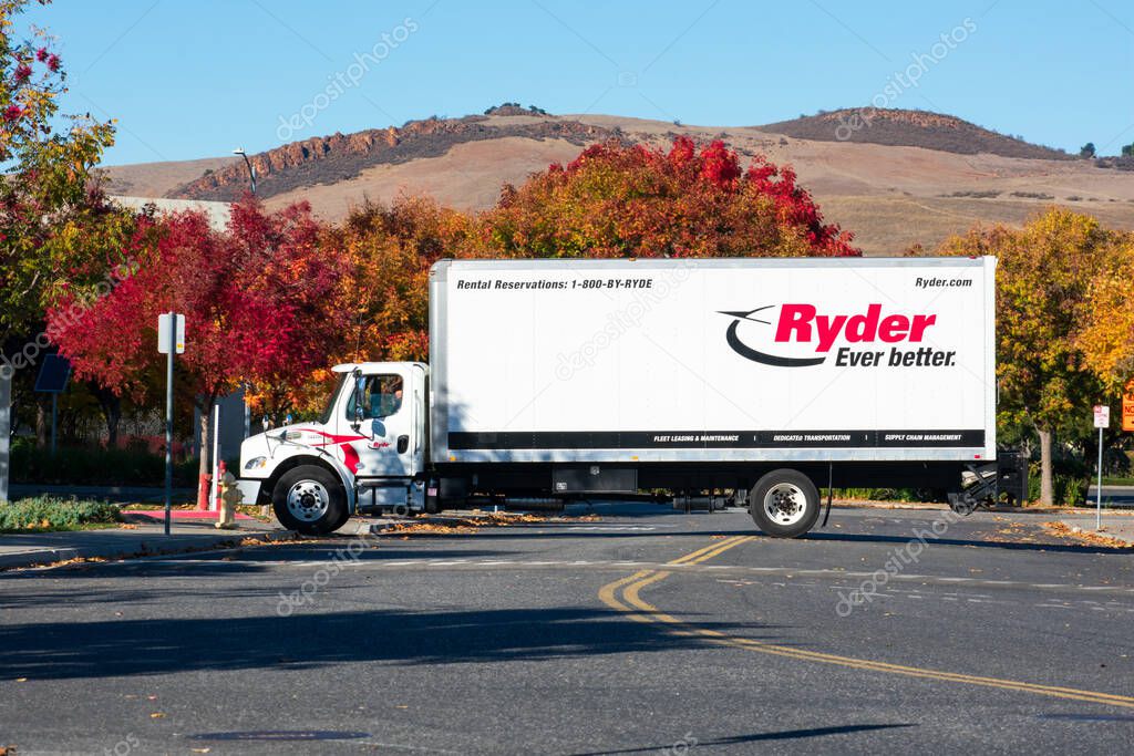 Ryder truck crossing the street. Ryder System, Inc. is an American provider of transportation and supply chain management products - San Jose, California, USA - 2020