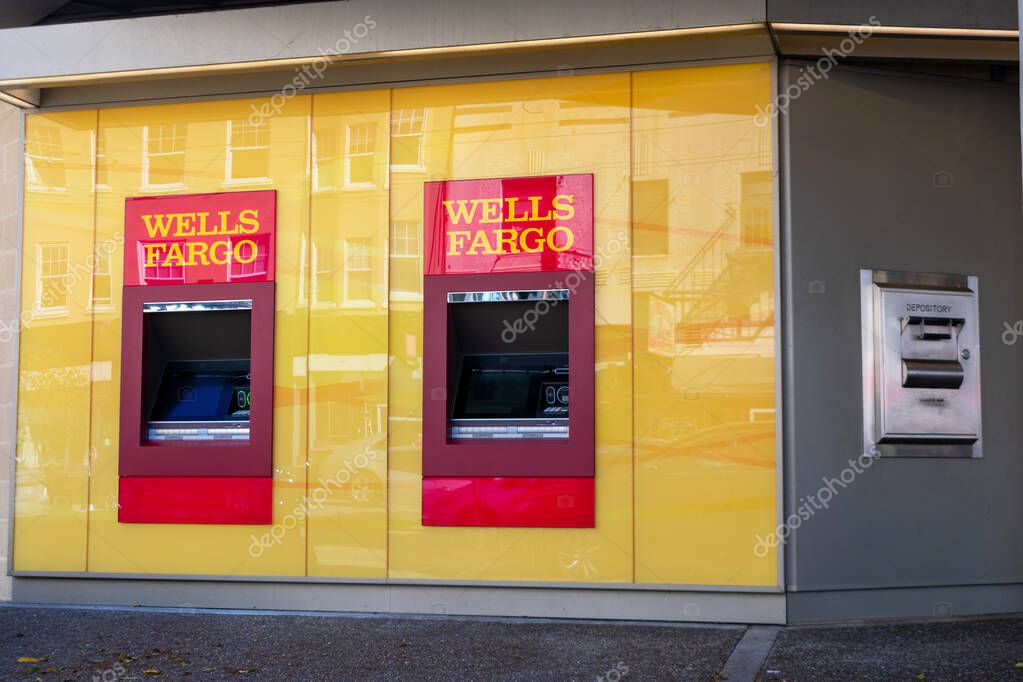 Two Wells Fargo outdoor ATM Machines and night depository secured bank drop box - San Francisco, California, USA - 2021