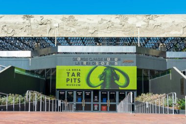 Empty entrance to La Brea Tar Pits museum. George C. Page museum facade and exterior - Los Angeles, California, USA - 2020 clipart