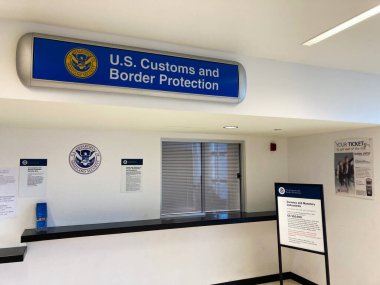 U.S. Customs and Border Protection sign at CBP office inside the terminal of LAX international airport - Los Angeles, California, USA - 2021 clipart