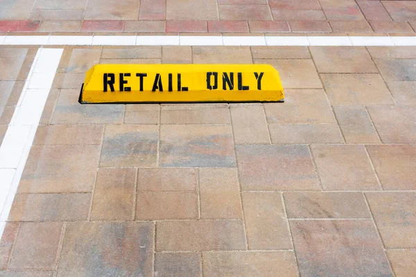 Retail Parking Only Sign Yellow Concrete Wheel Stop Located Parking — Stock Photo, Image