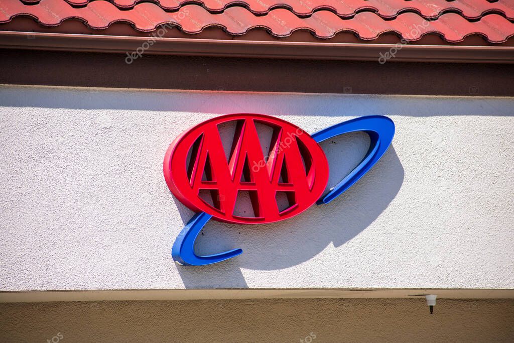 AAA sign at a branch of American Automobile Association privately held not-for-profit national member association and service organization - San Jose, California, USA - 2021