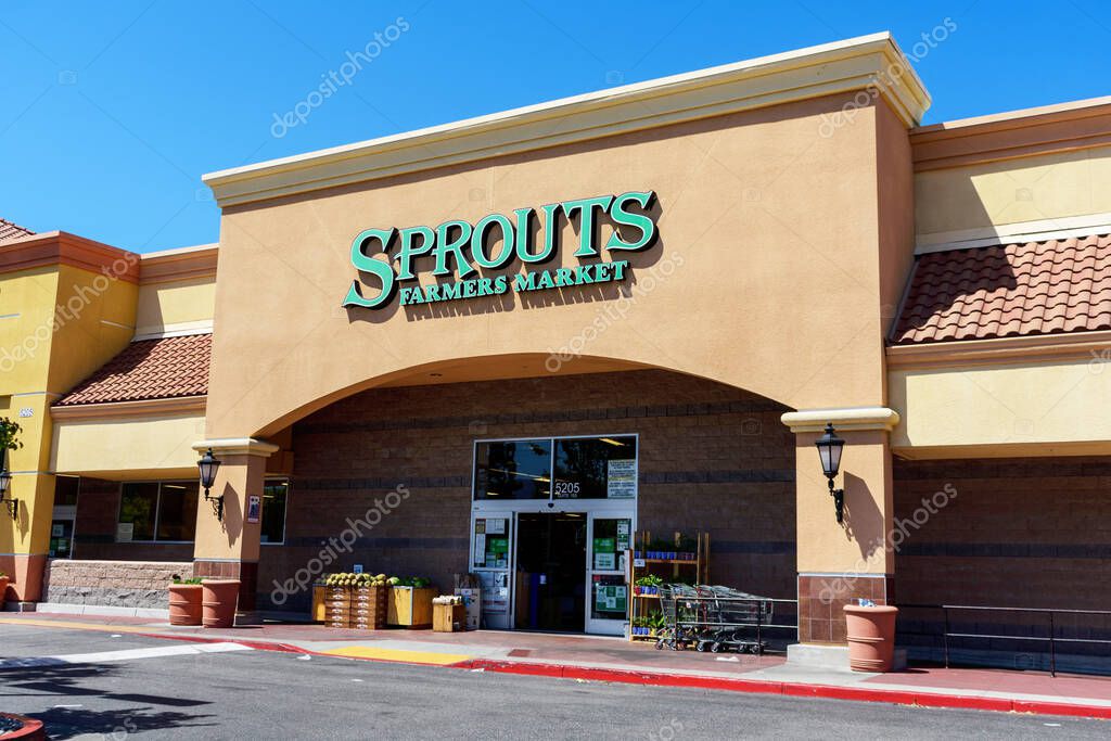 Sprouts Farmers Market sign above the retail grocery store entrance - San Jose, California, USA - 2021