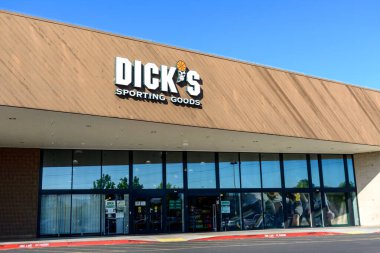 Dick's Sporting Goods sign on the facade of sporting goods retail chain store - San Jose, California, USA - 2021
