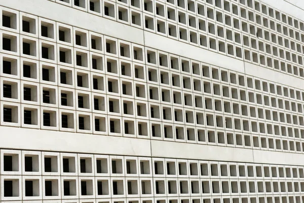 Precast concrete exterior wall panels of multi level modern parking garage facade