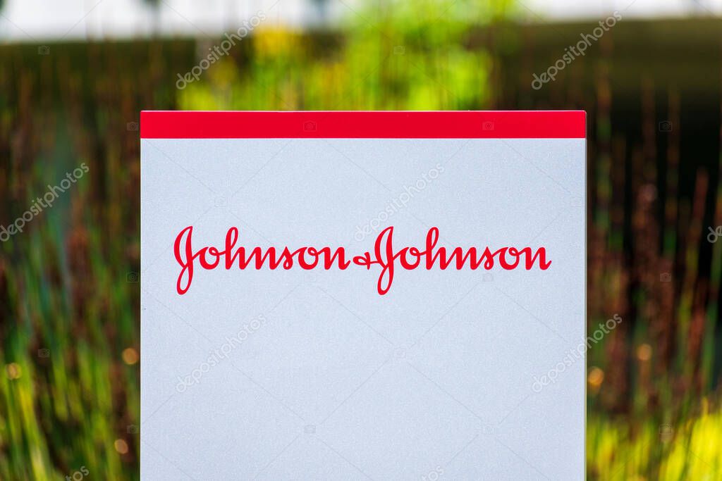 Johnson and Johnson sign, logo at an American multinational corporation office. The company develops medical devices, pharmaceuticals, and consumer packaged goods. - San Jose, California, USA - 2021