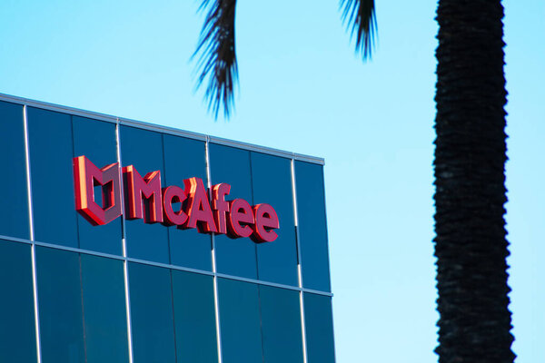 McAfee sign, logo on Silicon Valley headquarters of global computer security software company. - San Jose, California, USA - 2021