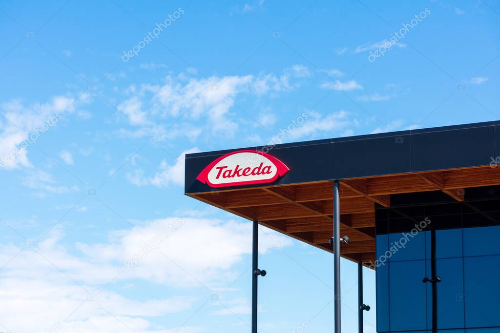 Takeda sign logo on the office building of Takeda Pharmaceutical Company Japanese multinational pharmaceutical and biopharmaceutical company - San Diego, California, USA - 2021