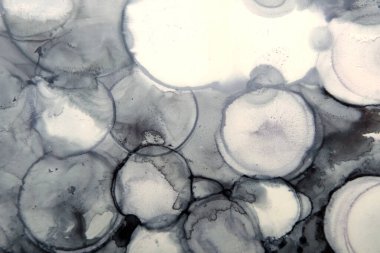 Mürekkep lekelerinin kirli arkaplanı mavi ve gri renklerde