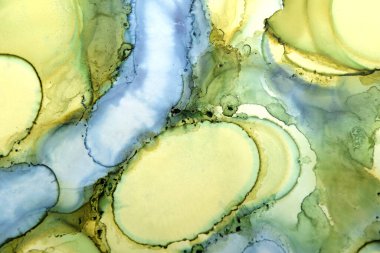 Yeşil renklerdeki mürekkep lekelerinin sanat arkaplanı